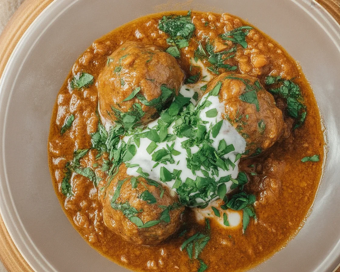 Delicious porcupine soup featuring chicken meatballs, mushrooms, and fresh vegetables.